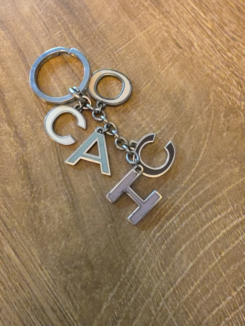Authentic Coach Silver Metal Keychain with Multi-Color Letter Charms